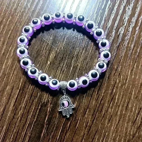 Purple eye watch with matching bracelet - Picture 7 of 9